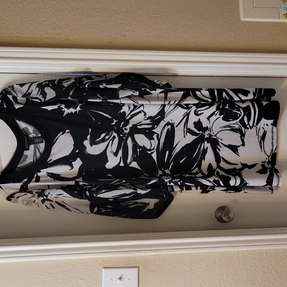 Plus size black and white knee length dress